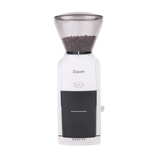 White and black coffee grinder with clear top containing coffee beans on a white background